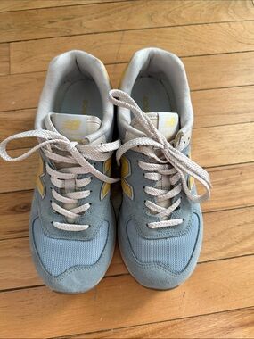 New Balance Powder Blue Sneakers with Yellow Accents